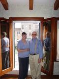 Parents in front of the balcony in the Venice Apartment